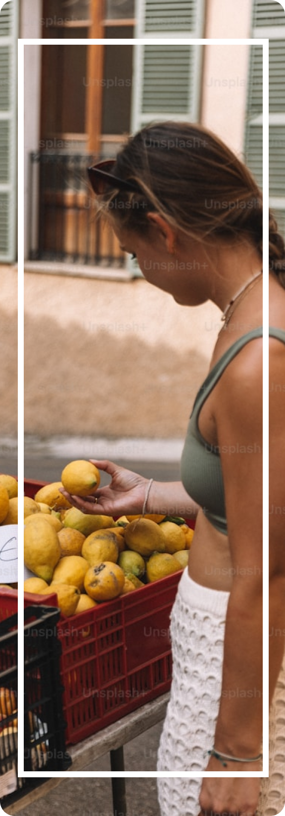 girl with fruits around her